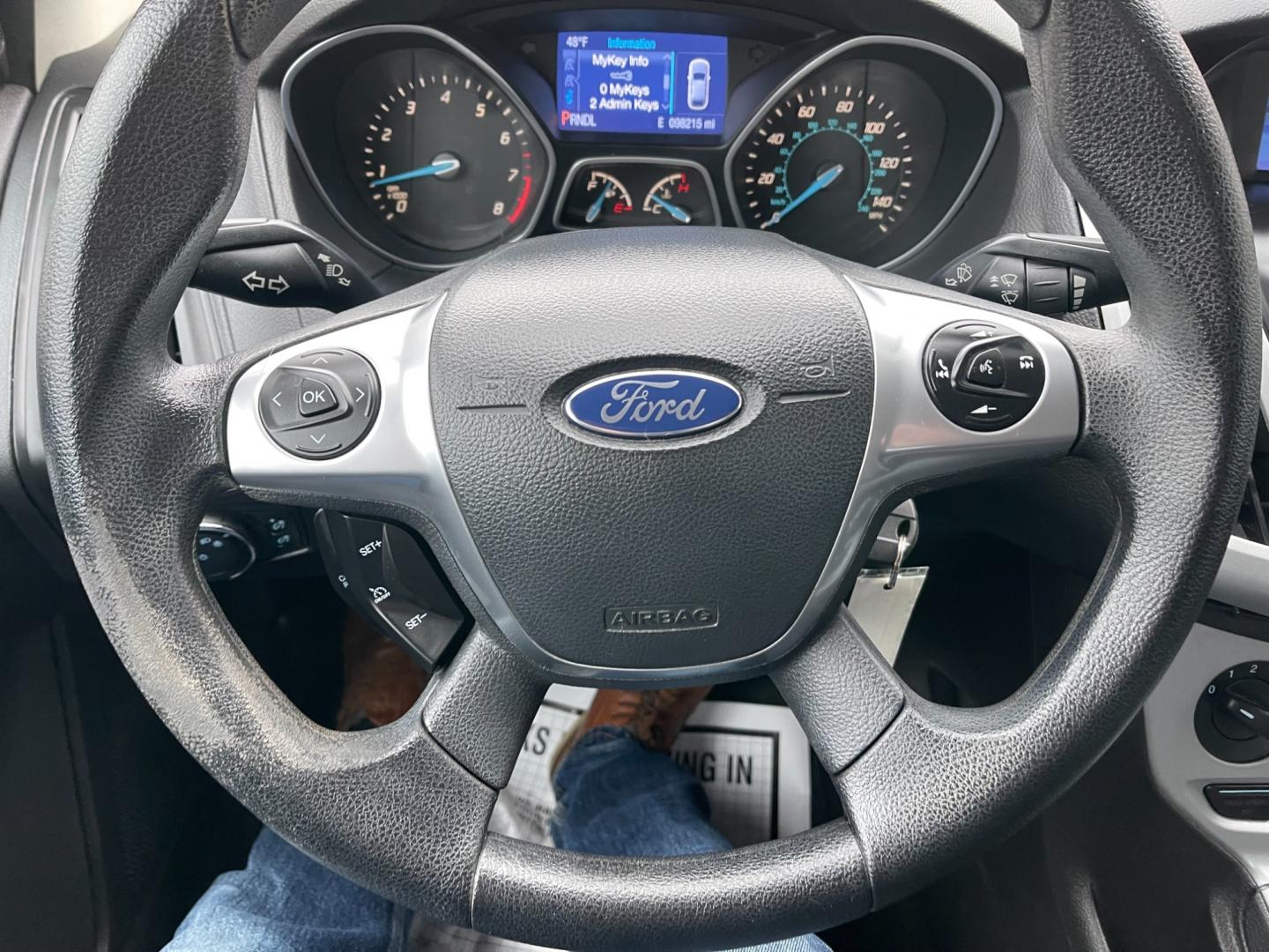 2014 Blue /Black Ford Focus SE Sedan (1FADP3F2XEL) with an 2.0L I4 DOHC 16V FFV engine, 6-Speed Automatic transmission, located at 547 E. Main St., Orwell, OH, 44076, (440) 437-5893, 41.535435, -80.847855 - Photo#22